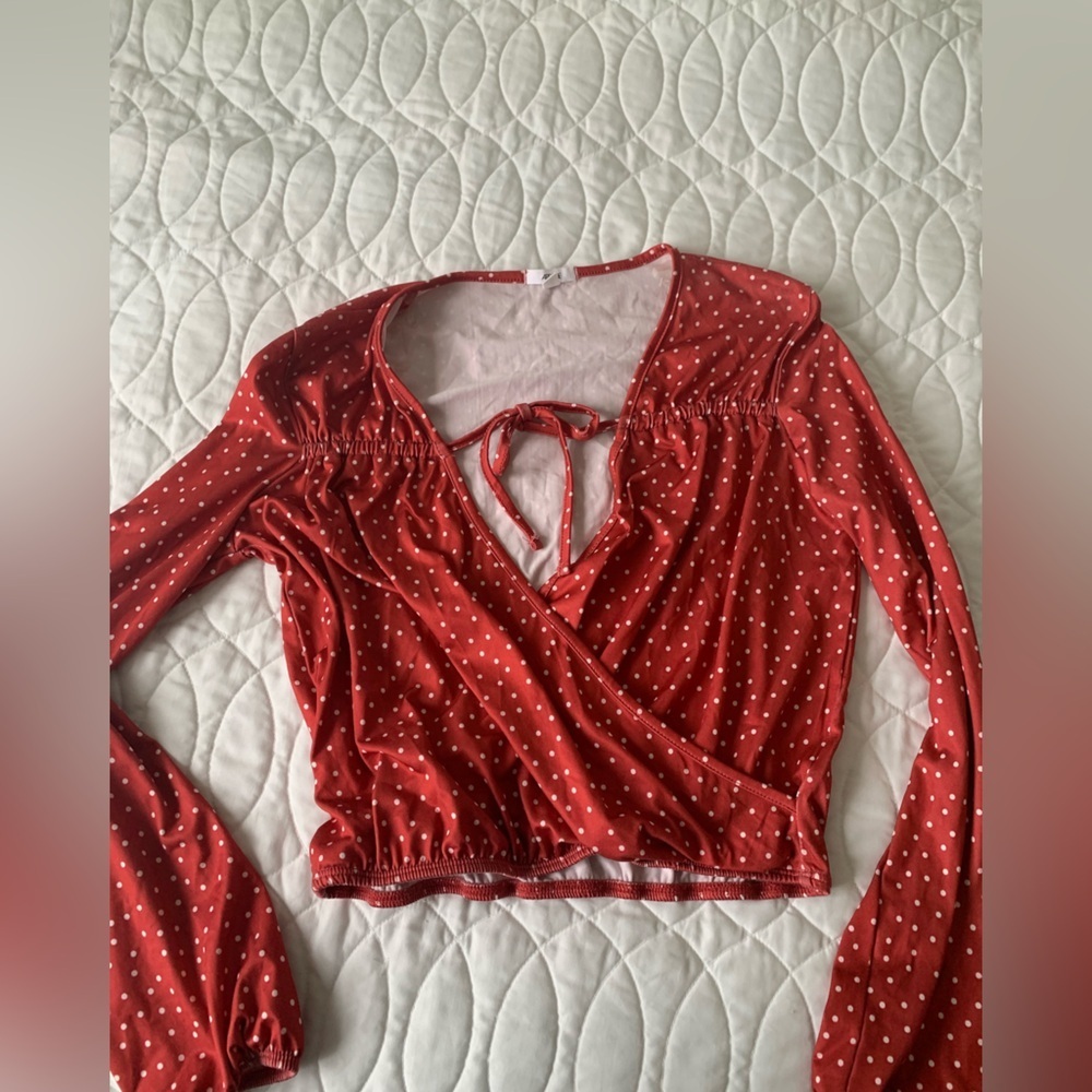 #18 Long sleeve wrap cropped top. Ardene size S